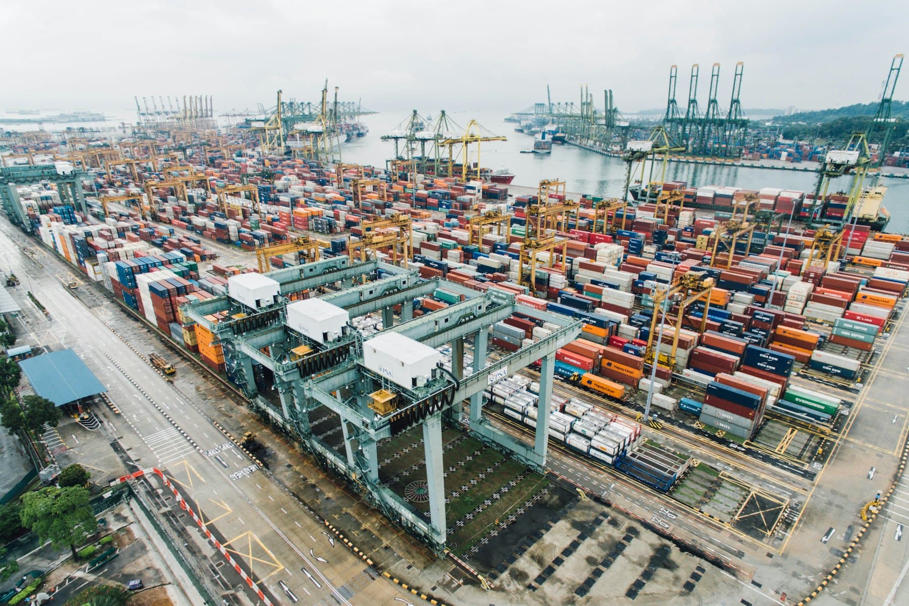 Container terminal with gantry cranes and stacked boxes