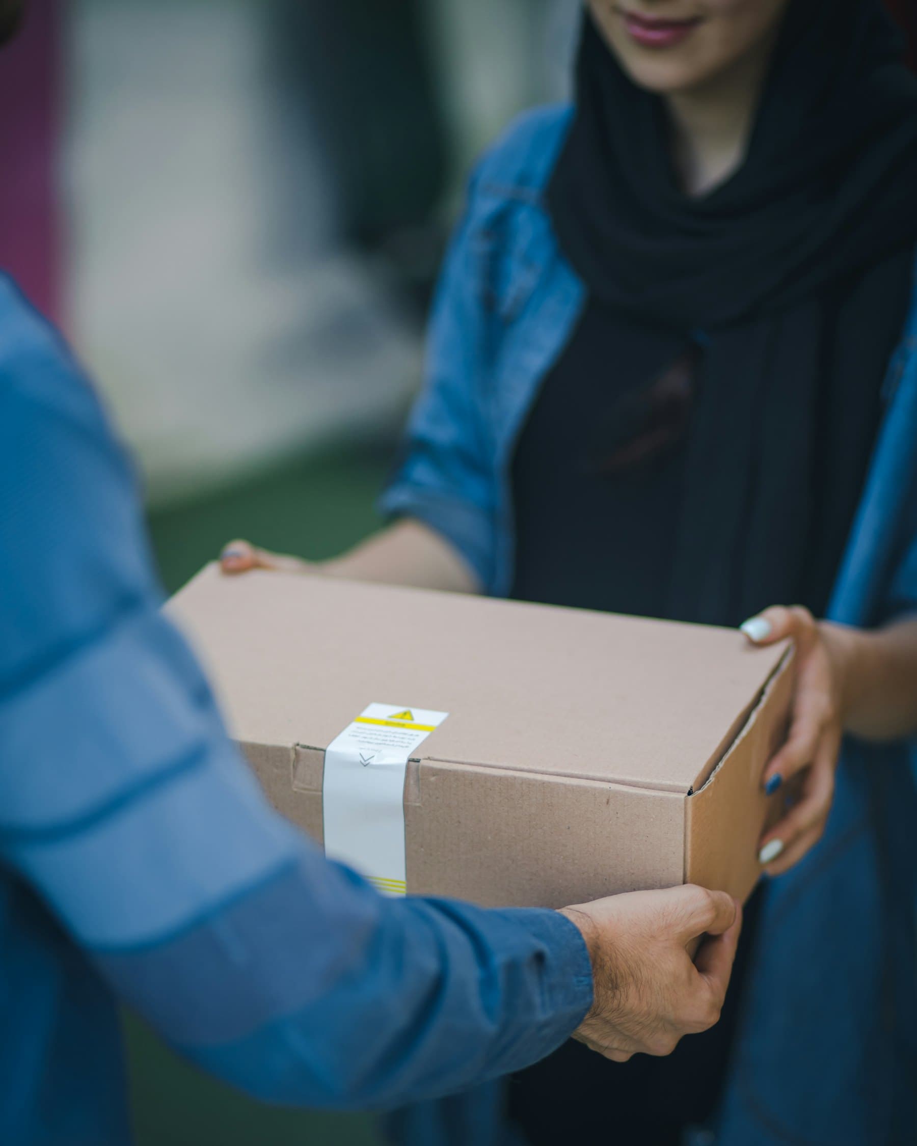 Parcel being handed over to a customer